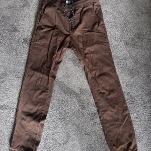 Brown tapered leg pants